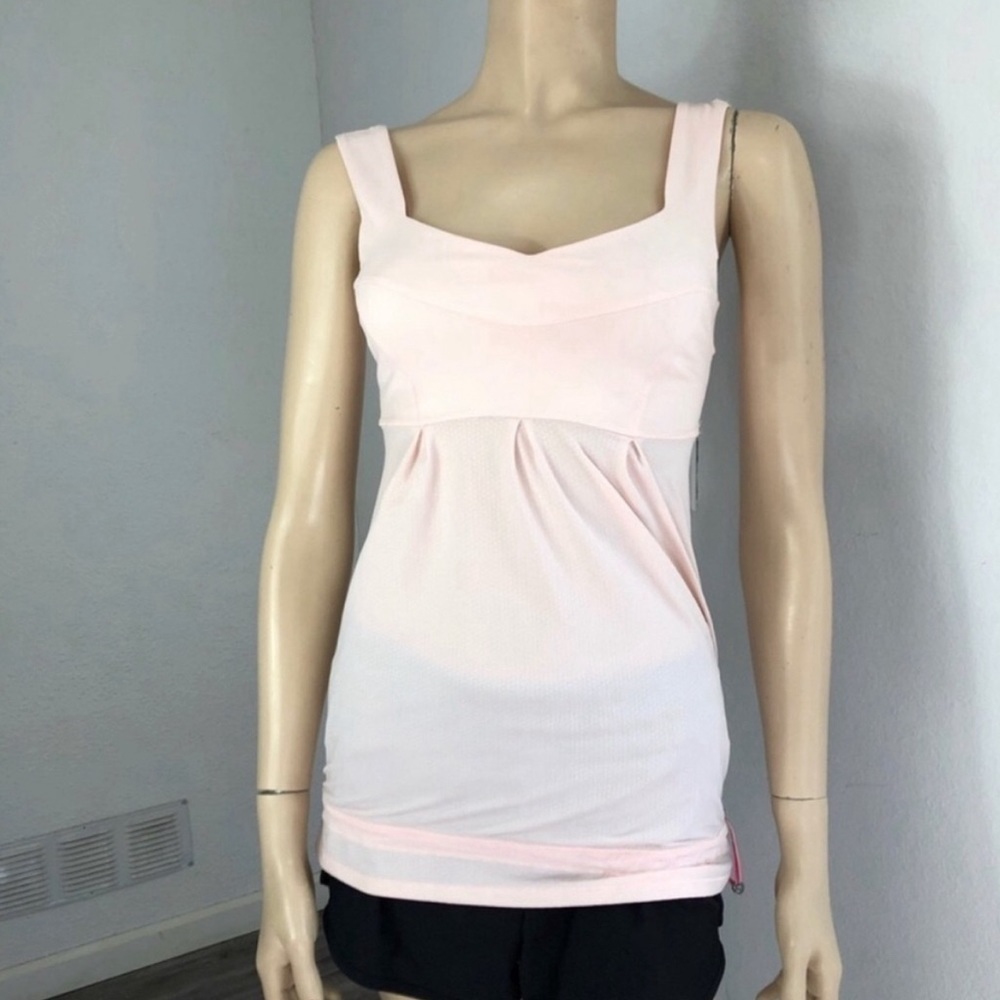 Lululemon shirt ajustable at the bottom soft pink size:2